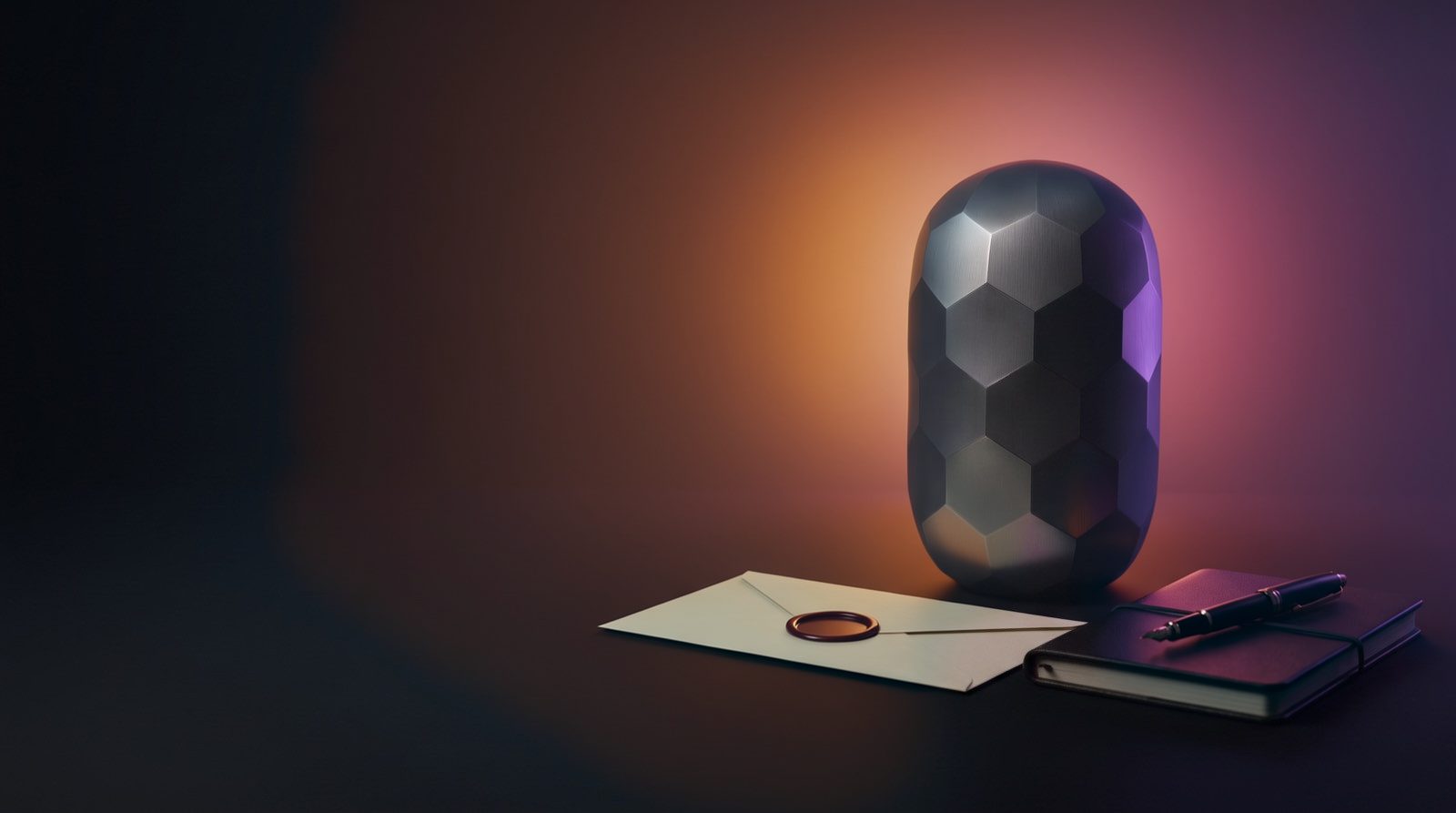 The Inheritans titanium capsule next to a sealed envelope and a closed notebook with a pen, with a warm amber and rose halo of light